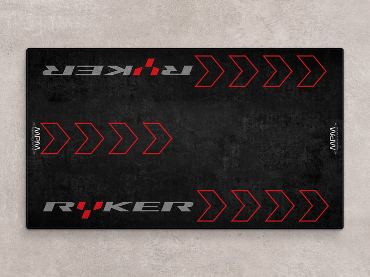 Parking mat and motorcycle rug for Can-Am Ryker. A bold garage accessory for track prep and standout motorcycle display styling.
