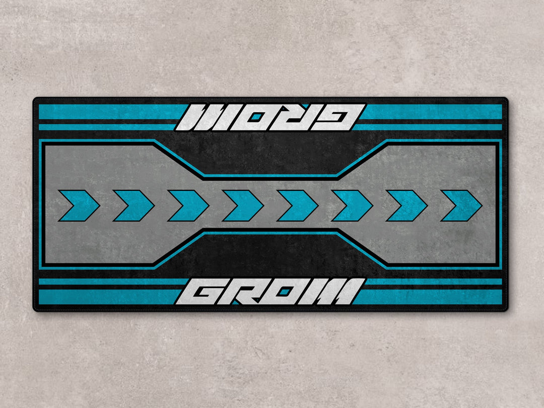 Honda Grom parking mat in blue-gray tones. Perfect garage floor cover and pit mat for superbike garage.