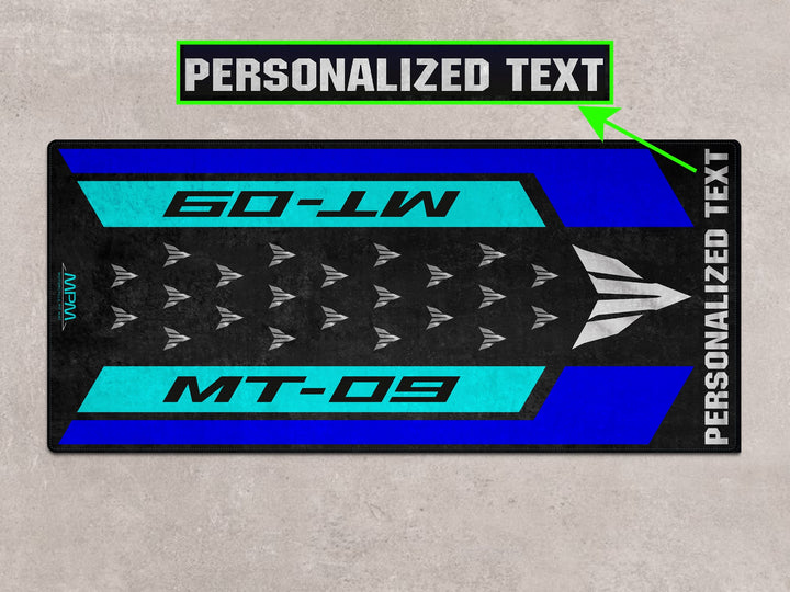 Personalized garage mat for Yamaha MT-09 in Icon Blue. Perfect motorcycle accessory for floor protection and style.
