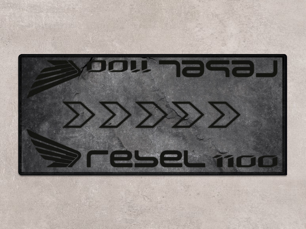 Honda Rebel 1100 motorcycle rug in gray stone look. Durable pit mat for garage floor protection and parts area.