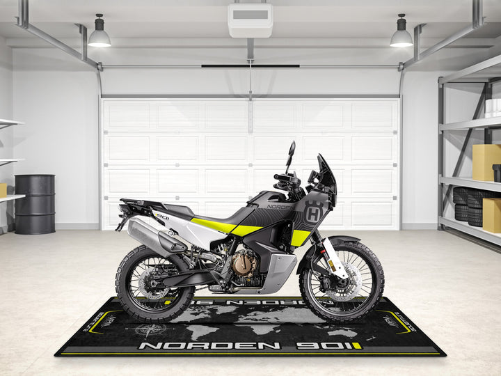 Husqvarna Norden 901 pit mat – world map garage carpet for motorcycle gear, showroom accessory, rider gift, and garage floor protection.