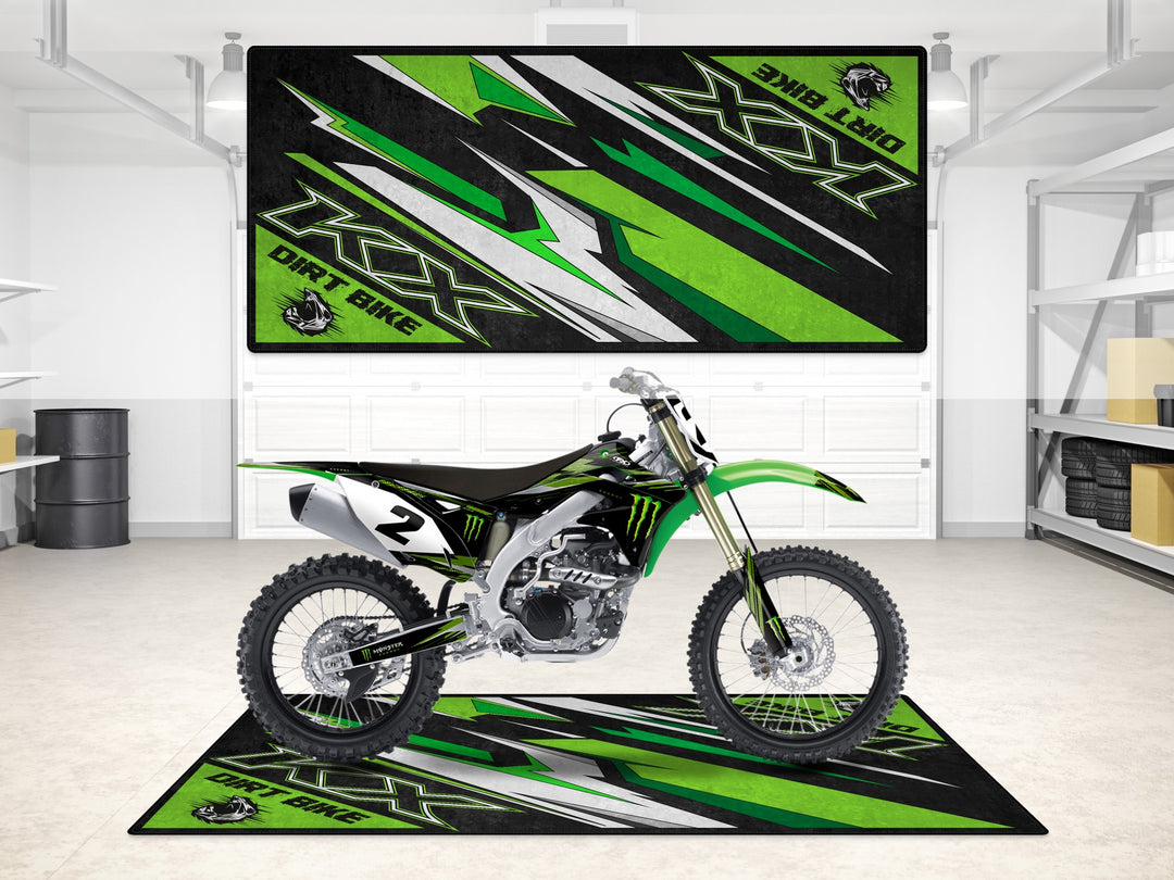 KX dirt bike parking mat with aggressive lime green design. Ideal floor cover for motocross riders.
