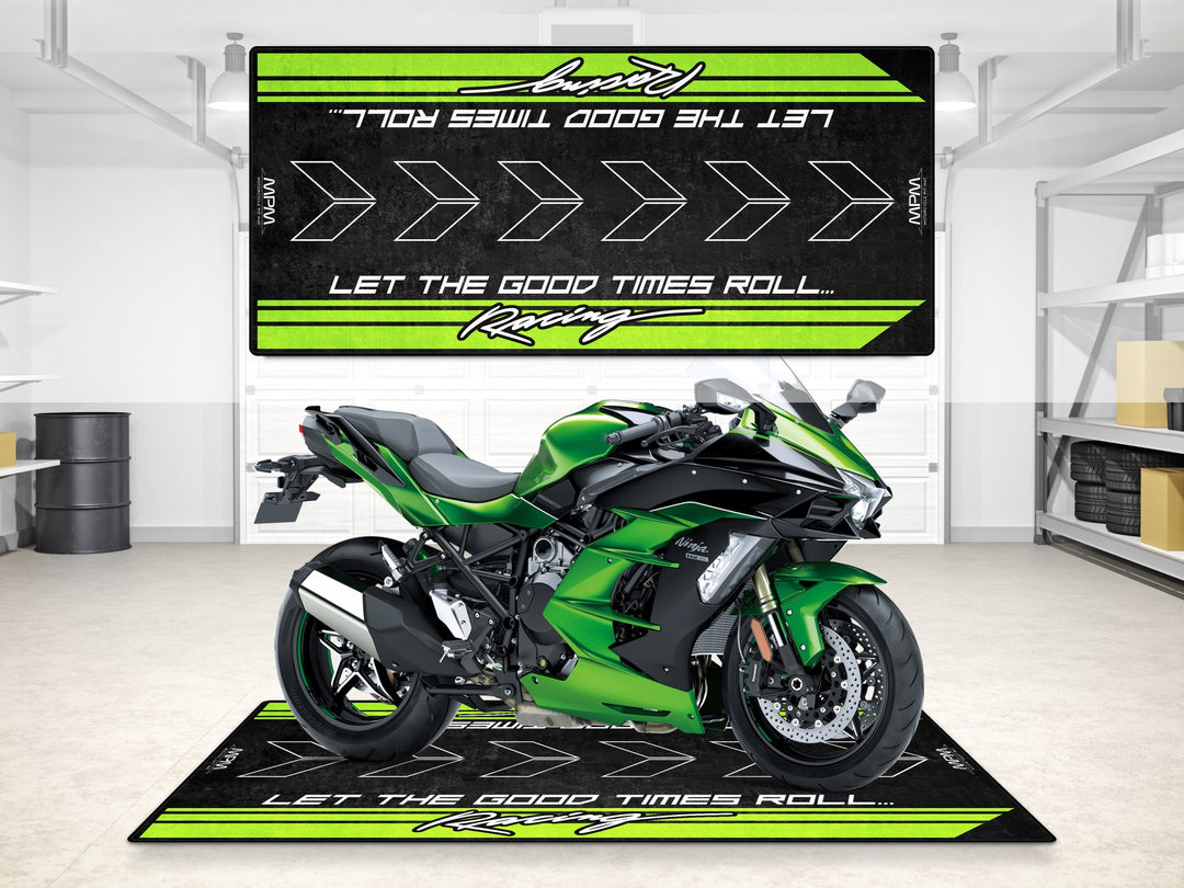 Kawasaki Ninja 400 on a garage mat designed for showroom, racetrack display, and Thermoplastic Rubber garage floor protection.