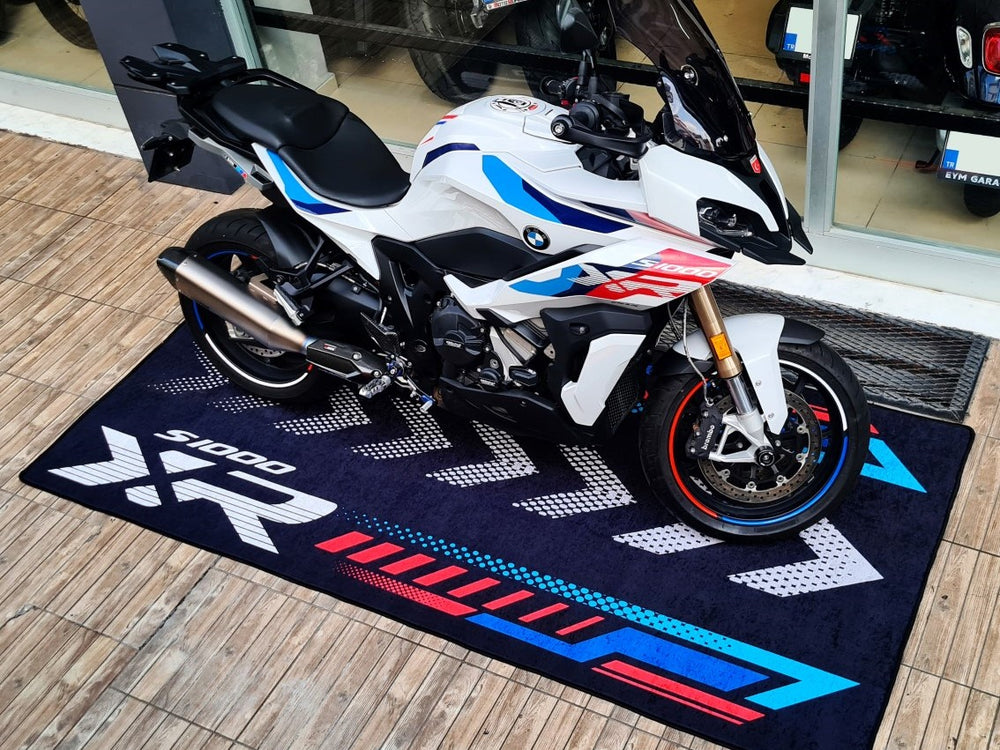 BMW S1000XR garage mat. Pit mat and motorcycle floor cover for protecting your space while highlighting your sport-touring bike.