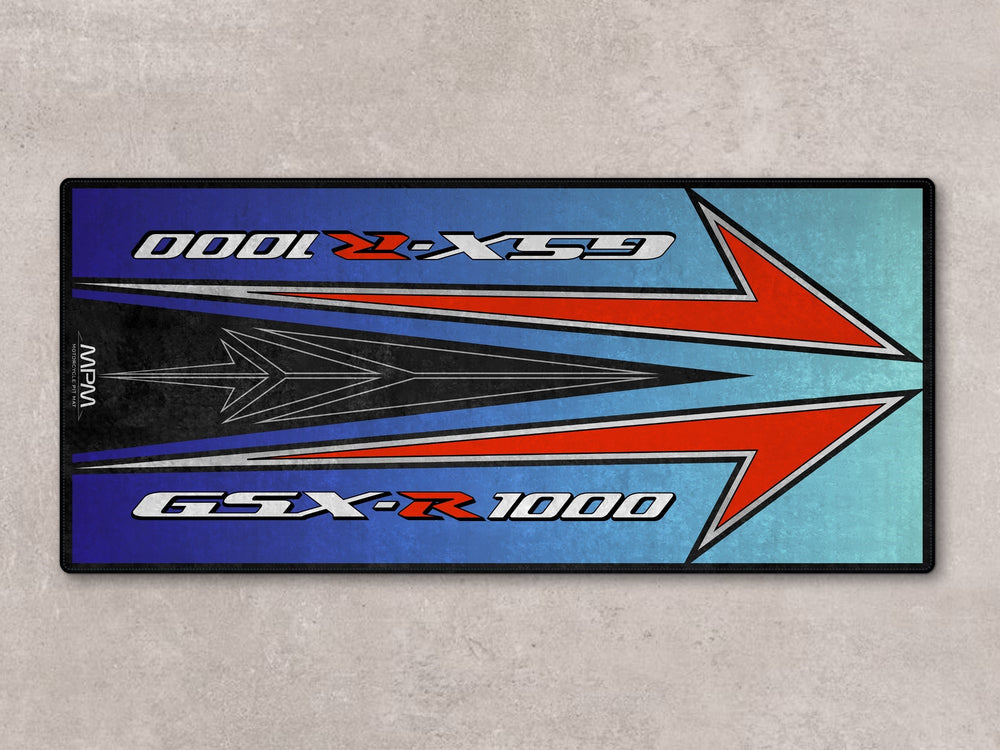GSX-R1000 pit mat with bold red arrow graphics. Made from Thermoplastic Rubber, perfect for garage floor cover or gift.