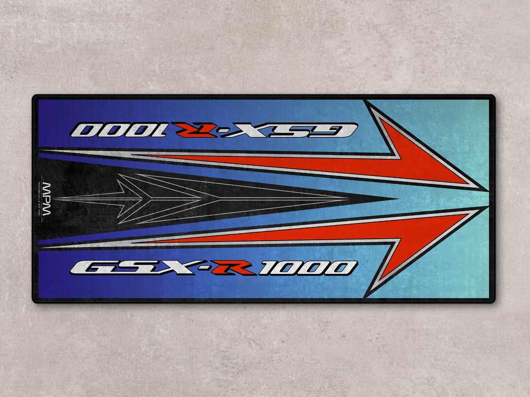 GSX-R1000 pit mat with bold red arrow graphics. Made from Thermoplastic Rubber, perfect for garage floor cover or gift.