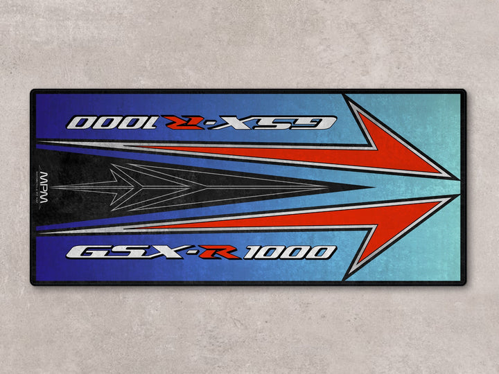 GSX-R1000 pit mat with bold red arrow graphics. Made from Thermoplastic Rubber, perfect for garage floor cover or gift.