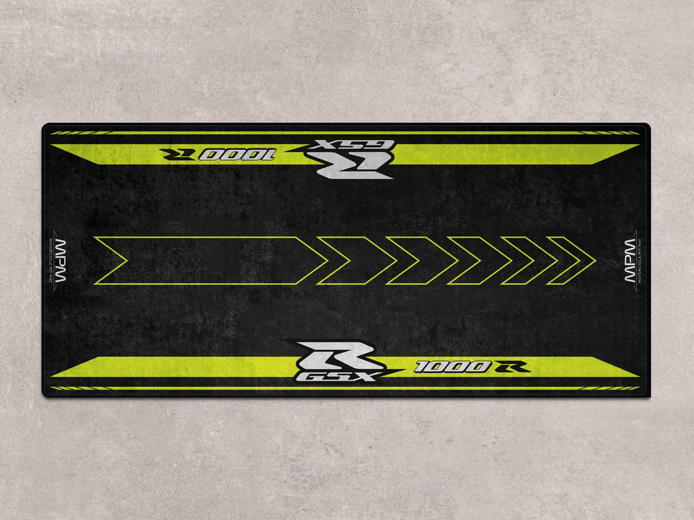 Black GSX-R1000R parking mat with vibrant pit mat design. Perfect for racetrack use, motorcycle display, or bike zone setup.