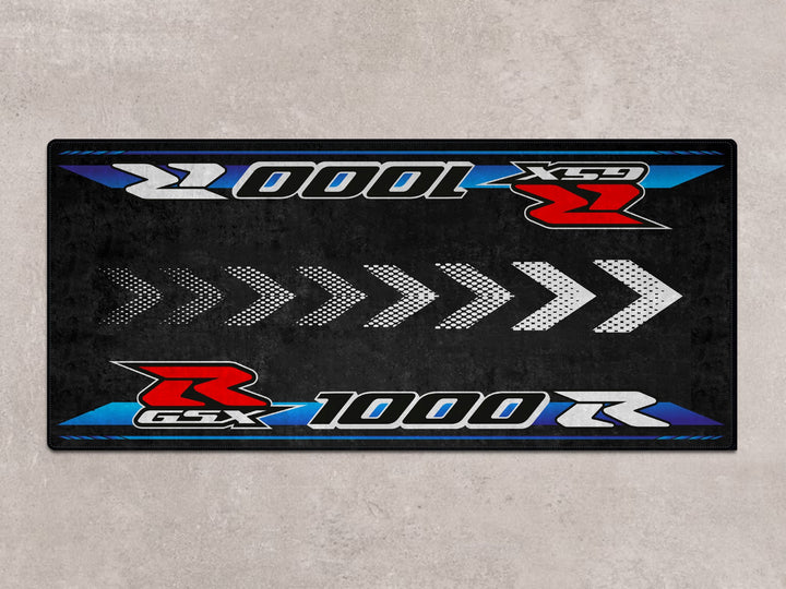 Motorsport-style parking mat for GSX-R1000R. Perfect rug for racetrack, bike zone, or motorcycle display areas.