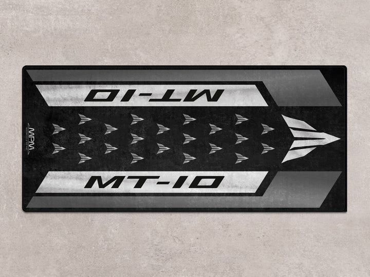 Tech Black MT-10 pit mat for motorcycle display. Rug style Thermoplastic Rubber mat for garage floor protection.