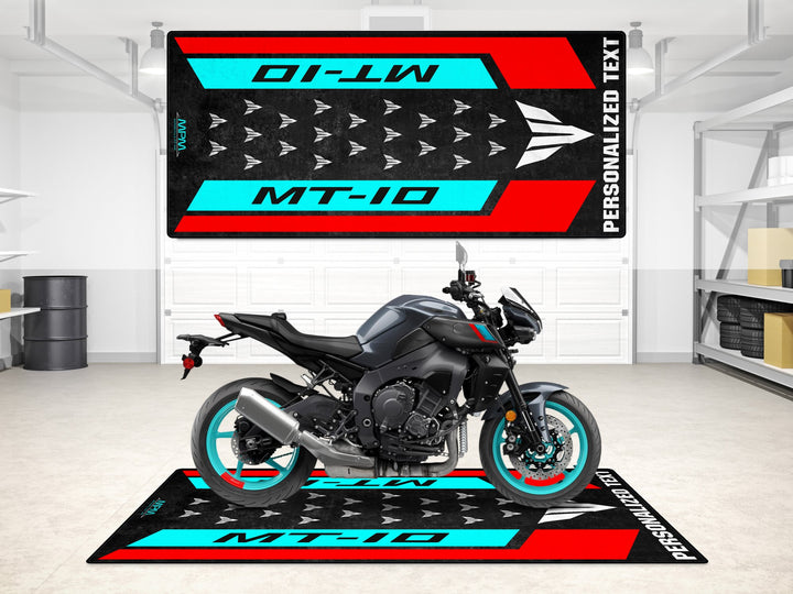 Custom cyan storm pit rug for MT-10 riders. Anti-slip motorcycle display mat for bike zone or parts area.