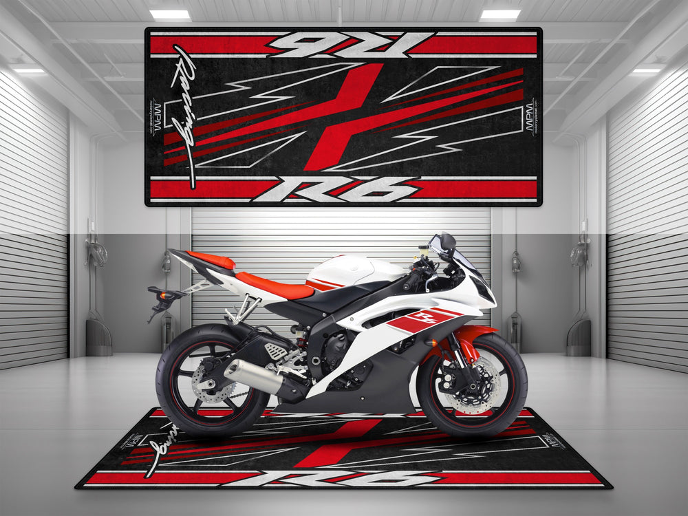 Red and white Yamaha R6 on garage rug designed for parking mat, showroom style, rider essentials, and garage floor protection.