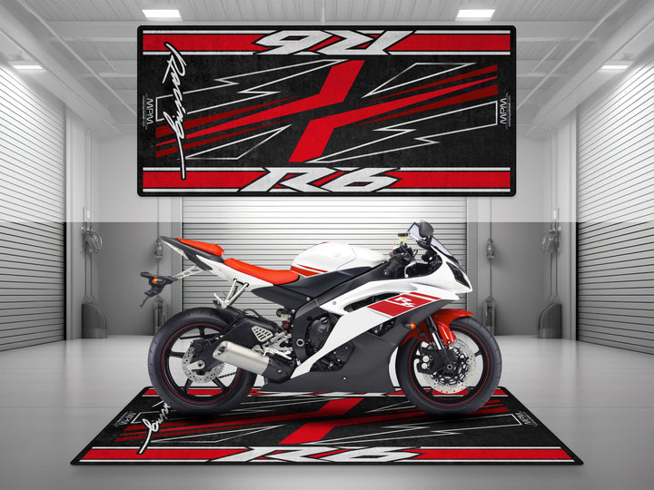 Red and white Yamaha R6 on garage rug designed for parking mat, showroom style, rider essentials, and garage floor protection.