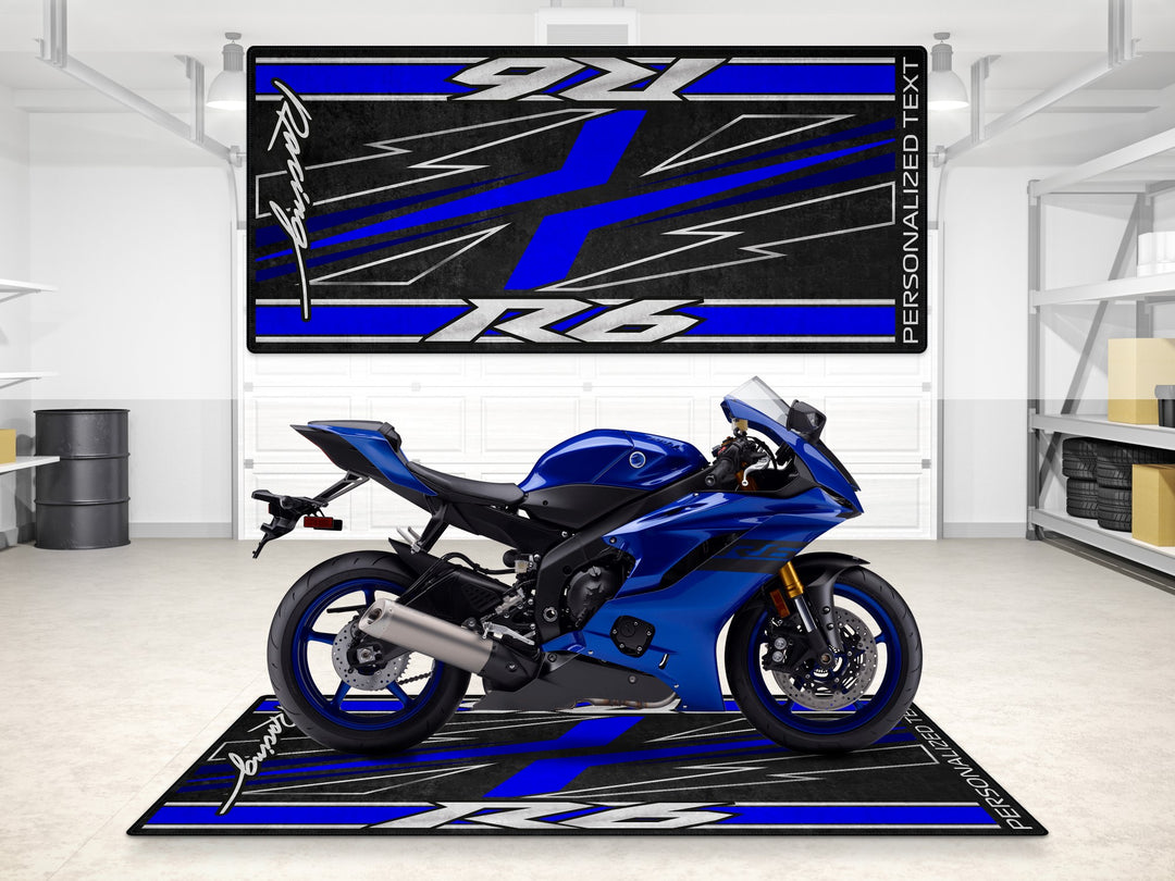 Garage mat with personalized text and R6 in Icon Blue, combining showroom visuals with Thermoplastic Rubber floor protection.