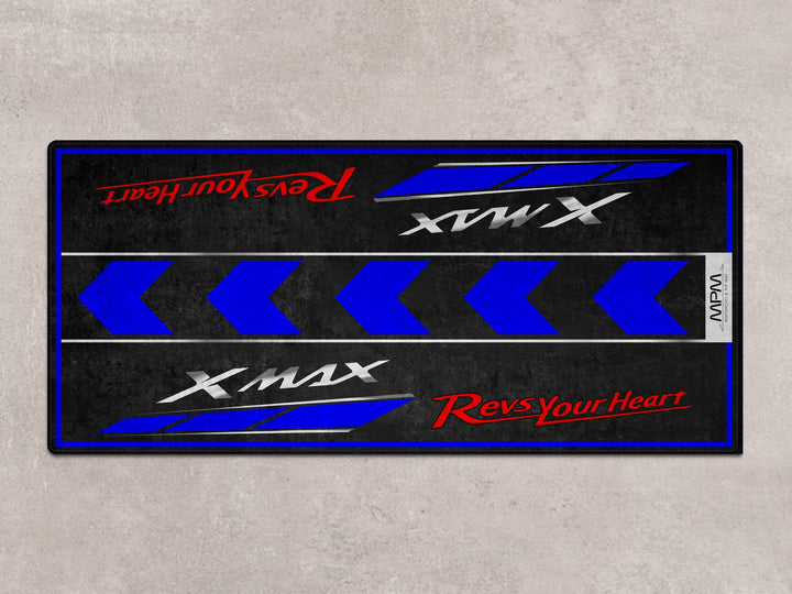 XMAX parking mat with bold blue accents. Premium Thermoplastic Rubber floor cover for garage floor protection.
