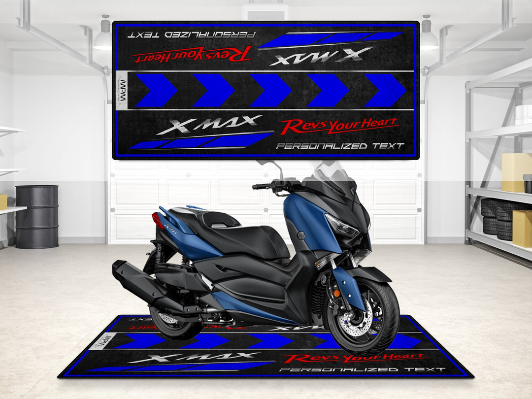 Custom pit rug with blue chevrons for Yamaha XMAX. Motorcycle display mat ideal for track prep and rider essentials.