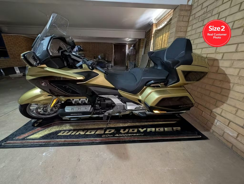 Honda Goldwing motorcycle pit mat in real garage setup, non-slip floor cover for touring bike display.
