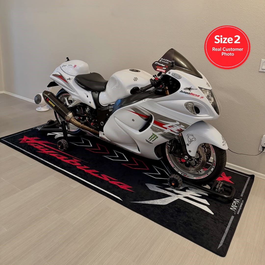 Suzuki Hayabusa motorcycle display on non-slip garage pit mat, indoor superbike storage and showcase solution.