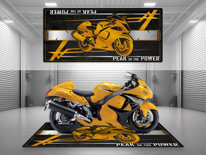 Suzuki Hayabusa Gen 2 yellow garage mat – bold showroom floor cover and eye-catching motorcycle pit rug for racetrack style.  
