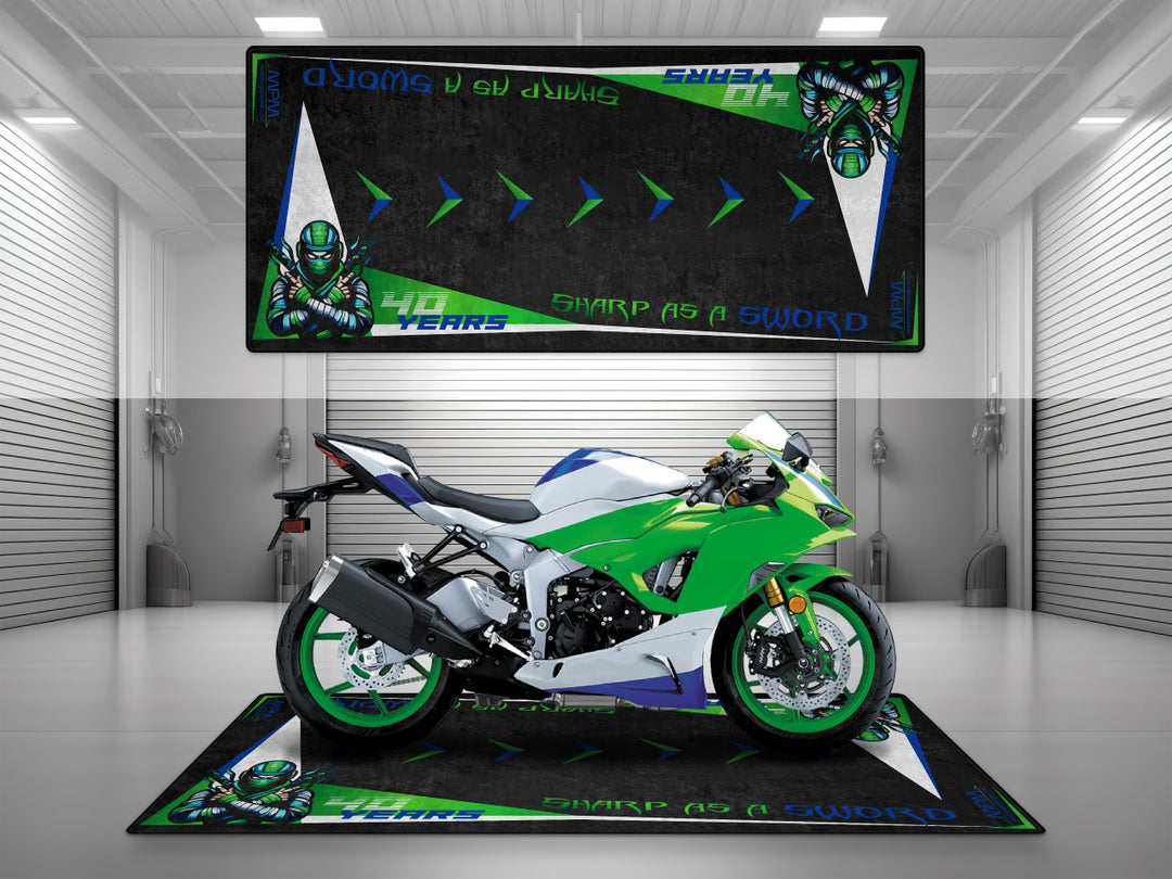 Ninja 40th anniversary garage mat with bold green-white-blue. Ideal pit mat for showroom display.
