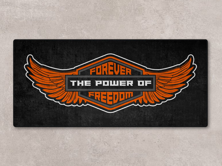 Pit mat with the image of a wing symbol of freedom and the words Forever The Power of Fredoom for chopper cruiser motorcycles