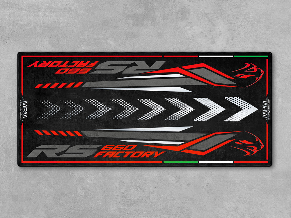 Aprilia RS 660 Factory Dark Banshee garage mat. Heavy-duty parking mat and parts-friendly floor cover for riders who value protection and display.
