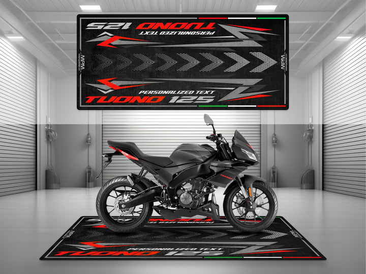 Personalized parking mat for Aprilia Tuono 125 Mamba Grey. Custom motorcycle gift and floor cover made for garage display and parts protection.
