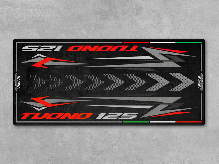 Aprilia Tuono 125 Mamba Grey motorcycle rug. Non-slip garage carpet and parts mat ideal for sportbike riders and showroom or garage floor setups.
