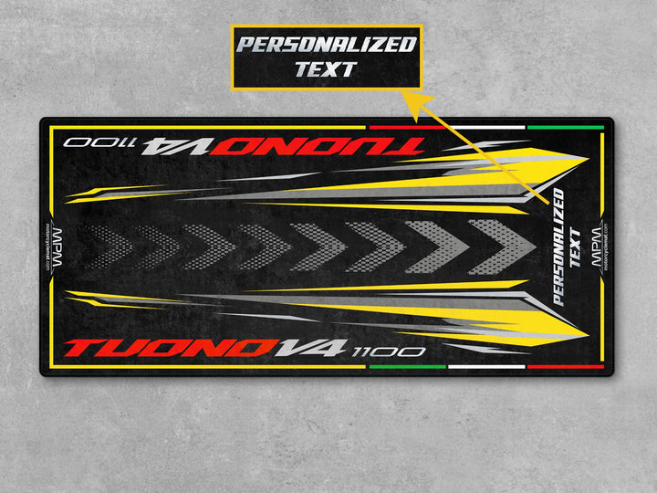 Custom-made parking mat for Aprilia Tuono Scorpion Yellow. Unique rider gift and garage pad for motorcycle events, pit setups or personal garage styling.
