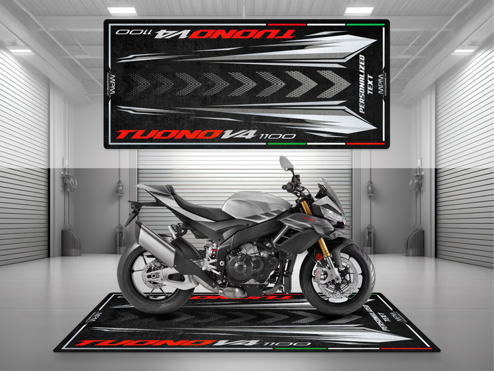 Personalized garage mat for Aprilia Tuono V4 1100 Shark Grey. Unique motorcycle gift and parts accessory for protecting and showcasing your sportbike.
