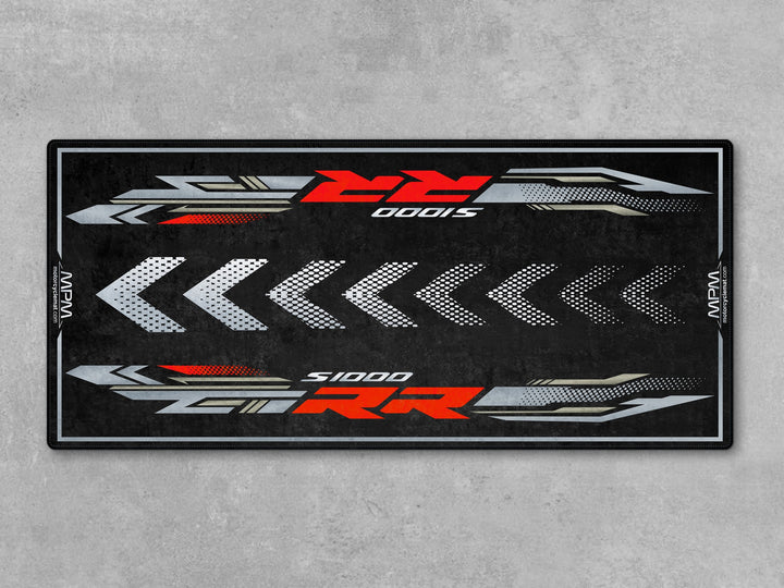 High-performance pit mat for BMW S1000RR Sport – a durable rug made with Thermoplastic Rubber for superbike garage display.
