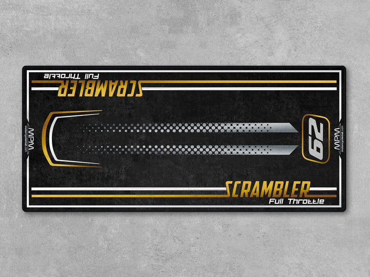 MPM custom garage mat designed for Ducati Scrambler 62 in clean studio environment