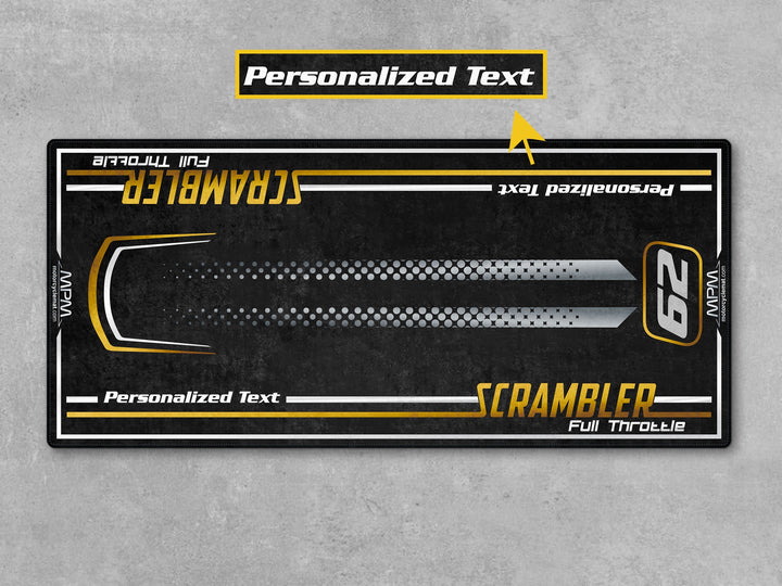 Ducati Scrambler 62 on custom MPM motorcycle garage mat with black and yellow design