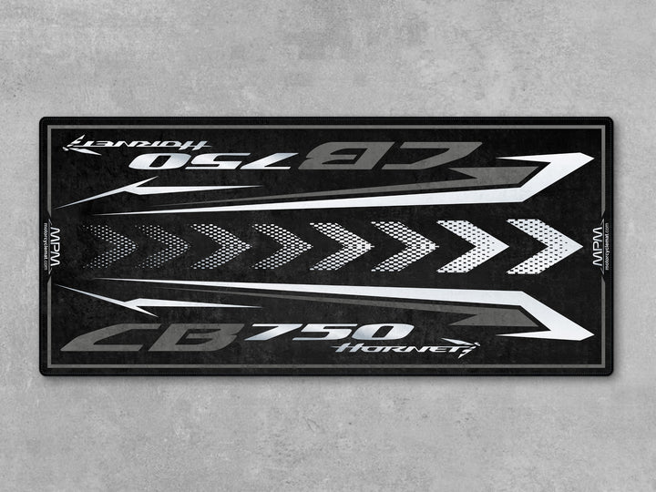 CB750 Hornet motorcycle display rug in matte black. Perfect carpet for racetrack prep and garage floor protection.
